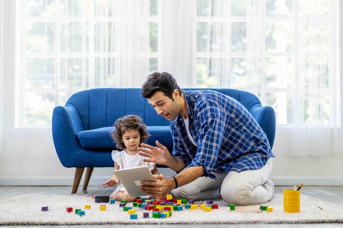 father making virtual video call with mother using tablet